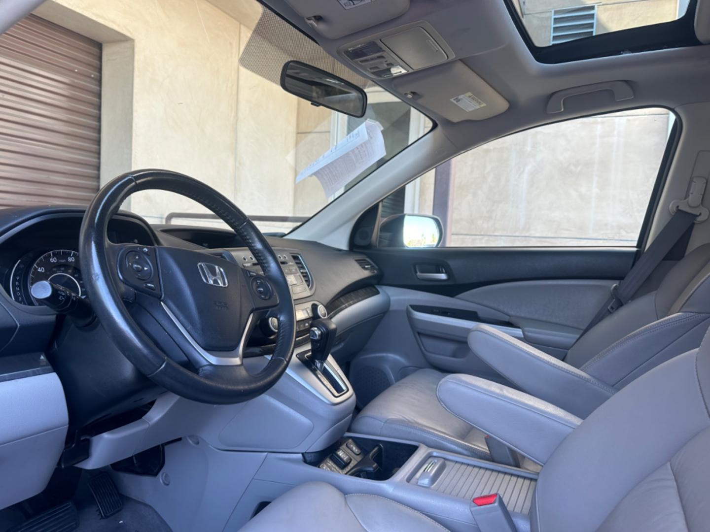 2012 BLUE /GRAY Honda CR-V leather (JHLRM3H70CC) with an 4 CYLINDER engine, Automatic transmission, located at 30 S. Berkeley Avenue, Pasadena, CA, 91107, (626) 248-7567, 34.145447, -118.109398 - Cars and Trucks!! Leather! Moon-roof! Well equipped! In the bustling streets of Pasadena, CA, and the vibrant neighborhoods of Altadena, Glendale, and the broader LA County, finding a reliable, stylish, and affordable vehicle can be a daunting task, especially if you're navigating the complexities - Photo#17